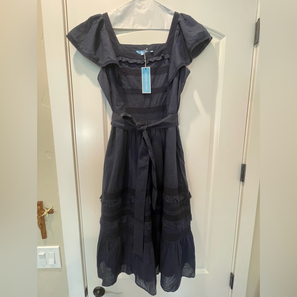 Navy blue cotton dress. Brand new. Two pockets at waist. Ribbon waist tie
